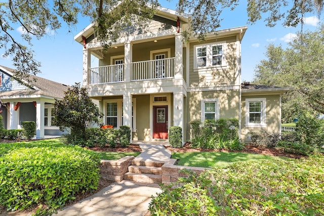 5401 Match Point Pl, Lithia, FL 33547 - view of front facade featuring a balcony and stucco siding