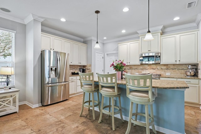 5401 Match Point Pl, Lithia, FL 33547 - kitchen featuring stainless steel appliances, decorative backsplash, baseboards, a center island, and light stone counters