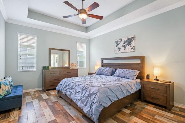 5401 Match Point Pl, Lithia, FL 33547 - bedroom with a tray ceiling, wood finished floors, baseboards, and ceiling fan