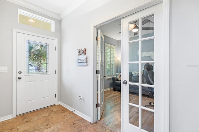 5401 Match Point Pl, Lithia, FL 33547 - entryway with crown molding, plenty of natural light, and baseboards