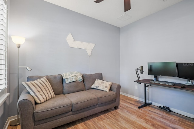 5401 Match Point Pl, Lithia, FL 33547 - office area featuring wood finished floors, a ceiling fan, and baseboards