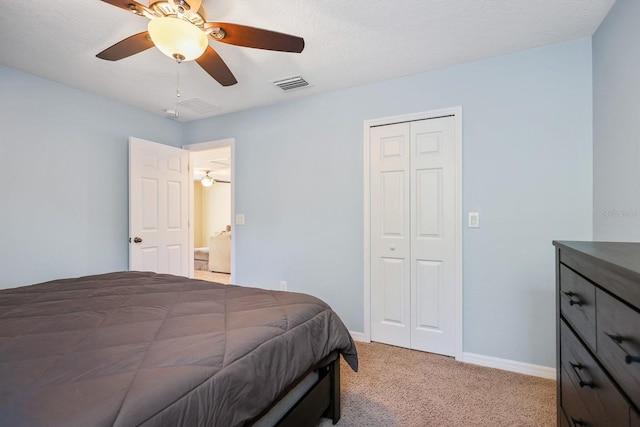 5401 Match Point Pl, Lithia, FL 33547 - bedroom with light colored carpet, baseboards, a closet, and a ceiling fan