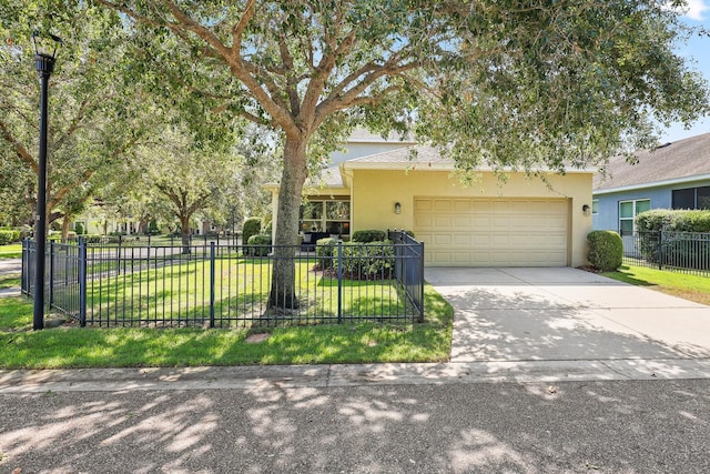 5401 Match Point Pl, Lithia, FL 33547 - view of front facade with an attached garage, driveway, and stucco siding