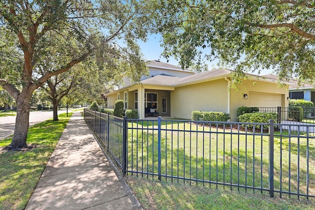 5401 Match Point Pl, Lithia, FL 33547 - view of front of home with stucco siding and a garage