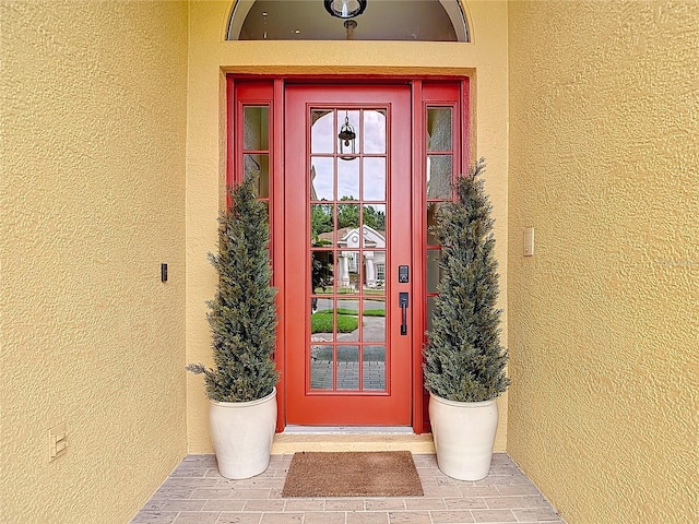 1443 Obear Ct, Wesley Chapel, FL 33543 - property entrance with stucco siding