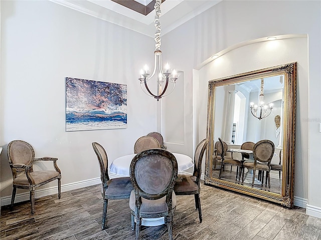 1443 Obear Ct, Wesley Chapel, FL 33543 - dining room with a chandelier, wood finished floors, and baseboards