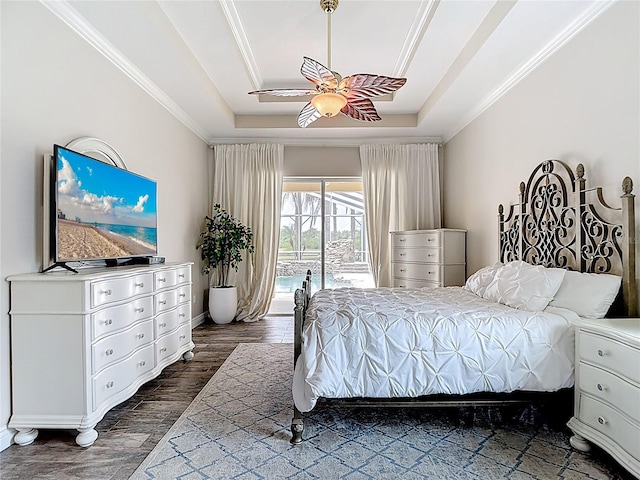 1443 Obear Ct, Wesley Chapel, FL 33543 - bedroom with a raised ceiling, access to outside, dark wood-style flooring, ornamental molding, and ceiling fan
