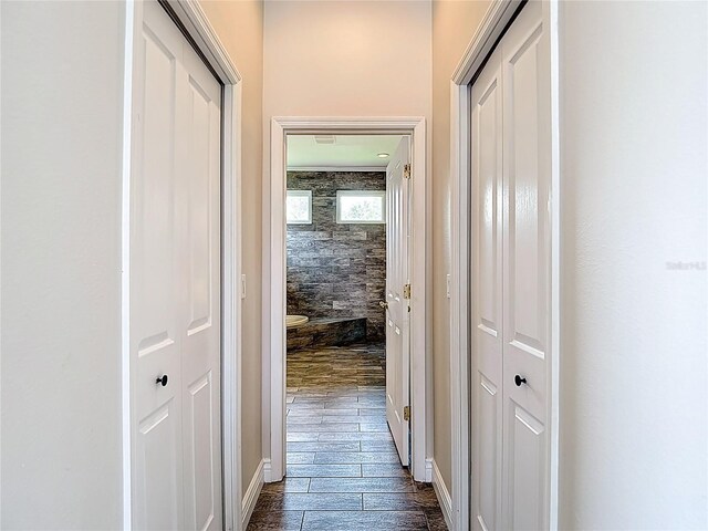 1443 Obear Ct, Wesley Chapel, FL 33543 - hallway with dark wood-style flooring and baseboards