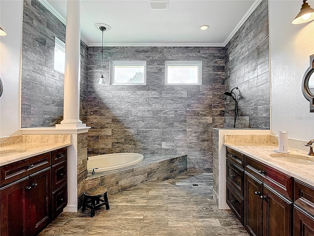 1443 Obear Ct, Wesley Chapel, FL 33543 - bathroom featuring ornamental molding, a walk in shower, a garden tub, and two vanities