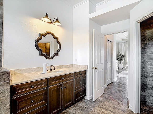 1443 Obear Ct, Wesley Chapel, FL 33543 - bathroom with vanity, wood finished floors, and crown molding