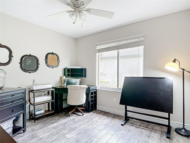 1443 Obear Ct, Wesley Chapel, FL 33543 - office area featuring a ceiling fan, wood finished floors, and baseboards