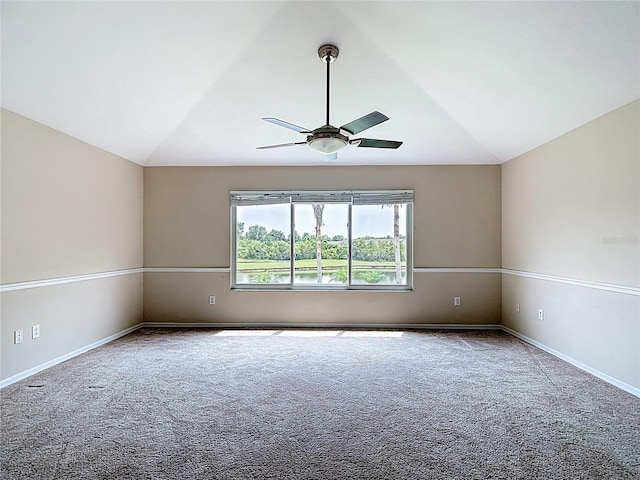 1443 Obear Ct, Wesley Chapel, FL 33543 - unfurnished room featuring lofted ceiling, carpet floors, a ceiling fan, and baseboards