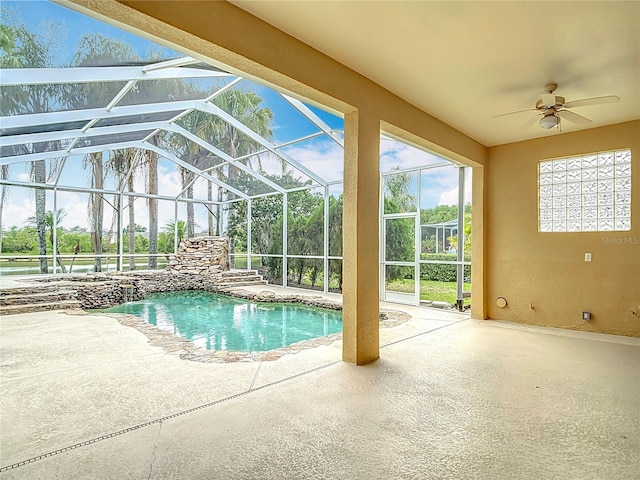 1443 Obear Ct, Wesley Chapel, FL 33543 - swimming pool with a patio area, ceiling fan, and a lanai