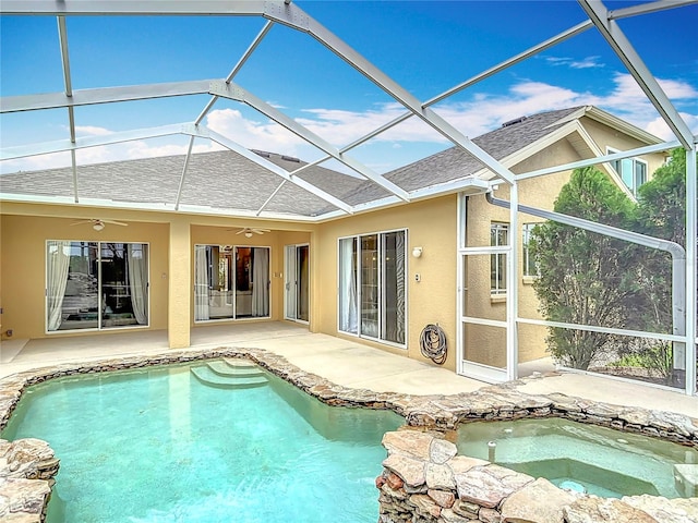 1443 Obear Ct, Wesley Chapel, FL 33543 - outdoor pool featuring a ceiling fan, an in-ground hot tub, a patio, and glass enclosure
