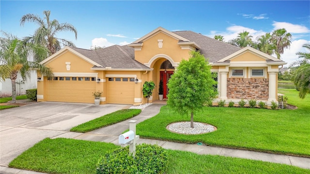 1443 Obear Ct, Wesley Chapel, FL 33543 - view of front of home featuring stucco siding, a garage, concrete driveway, and a front lawn