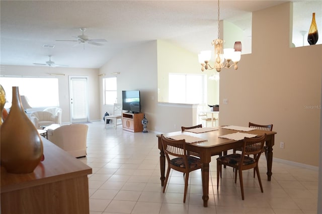 2325 Brookfield Greens Cir Unit 41, Sun City Center, FL 33573 - dining room featuring lofted ceiling, a chandelier, baseboards, and light tile patterned flooring