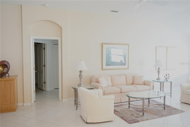 2325 Brookfield Greens Cir Unit 41, Sun City Center, FL 33573 - living area with light tile patterned flooring and baseboards