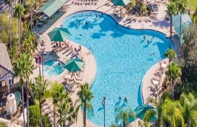 2325 Brookfield Greens Cir Unit 41, Sun City Center, FL 33573 - drone / aerial view of a pool