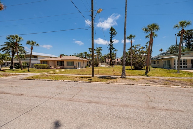3111 S De Bazan Ave, St Pete Beach, FL 33706 - single story home featuring a front yard and driveway