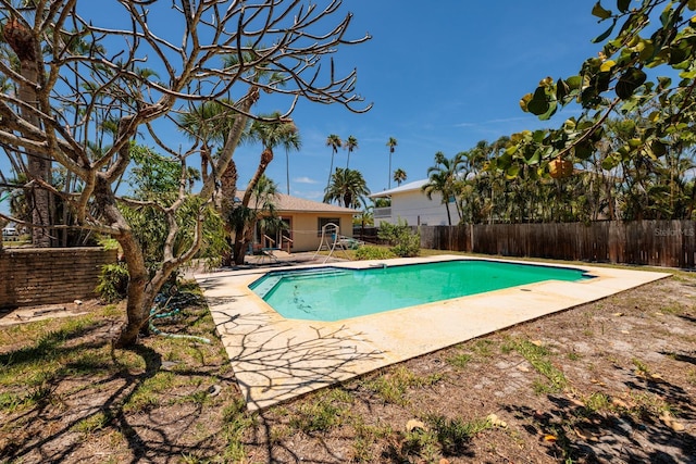 3111 S De Bazan Ave, St Pete Beach, FL 33706 - view of swimming pool featuring a patio and a fenced backyard