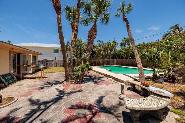 3111 S De Bazan Ave, St Pete Beach, FL 33706 - view of swimming pool with a fenced backyard and a patio area