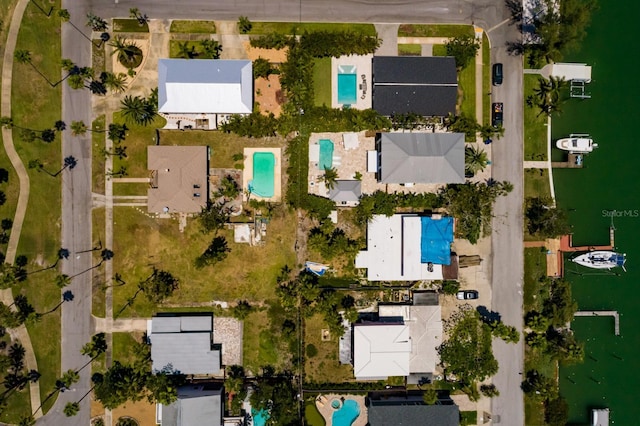 3111 S De Bazan Ave, St Pete Beach, FL 33706 - aerial view of property and surrounding area featuring a large body of water and a pool