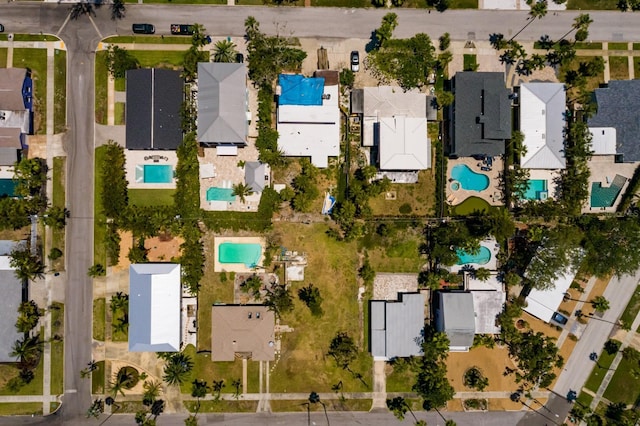 3111 S De Bazan Ave, St Pete Beach, FL 33706 - aerial view of residential area featuring a pool