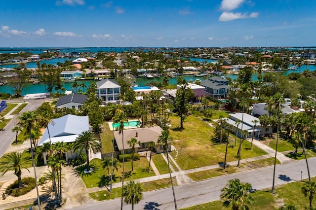 3111 S De Bazan Ave, St Pete Beach, FL 33706 - aerial view of residential area featuring a nearby body of water