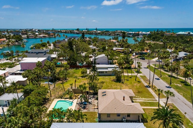 3111 S De Bazan Ave, St Pete Beach, FL 33706 - aerial perspective of suburban area featuring a nearby body of water