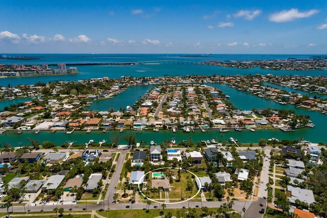 3111 S De Bazan Ave, St Pete Beach, FL 33706 - aerial perspective of suburban area featuring a nearby body of water