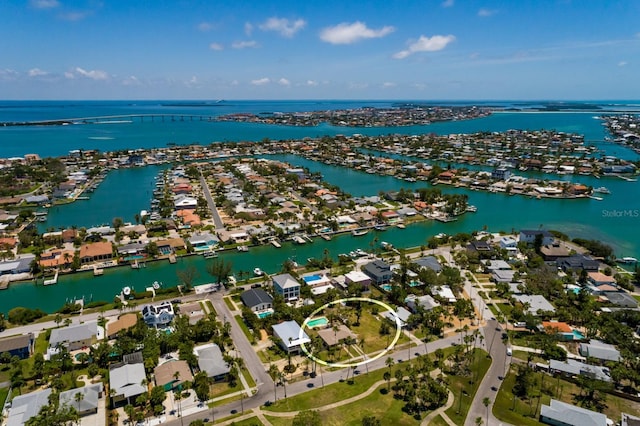 3111 S De Bazan Ave, St Pete Beach, FL 33706 - aerial view of residential area with a large body of water
