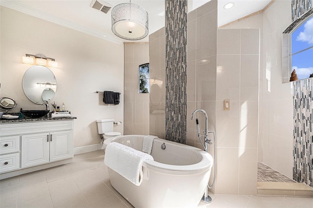 4353 Dewey Dr, New Port Richey, FL 34652 - full bath featuring a freestanding tub, crown molding, vanity, toilet, and walk in shower