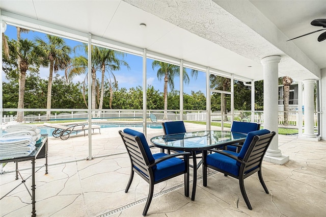 4353 Dewey Dr, New Port Richey, FL 34652 - sunroom with plenty of natural light and view of wooded area