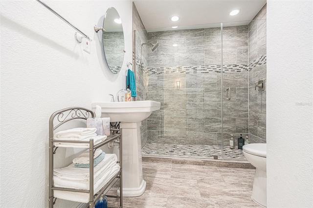 4353 Dewey Dr, New Port Richey, FL 34652 - bathroom with toilet, a shower stall, and recessed lighting