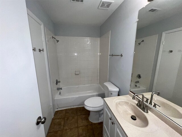14667 Pine Glen Crk Unit 14667, Lutz, FL 33559 - bathroom featuring toilet,  shower combination, vanity, and tile patterned flooring