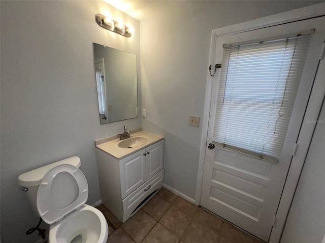 14667 Pine Glen Crk Unit 14667, Lutz, FL 33559 - bathroom with vanity, toilet, and tile patterned flooring