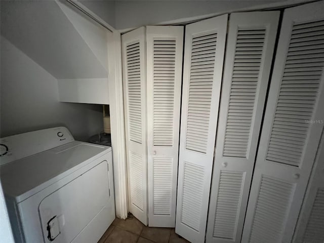 14667 Pine Glen Crk Unit 14667, Lutz, FL 33559 - laundry area featuring washer / clothes dryer and dark tile patterned floors