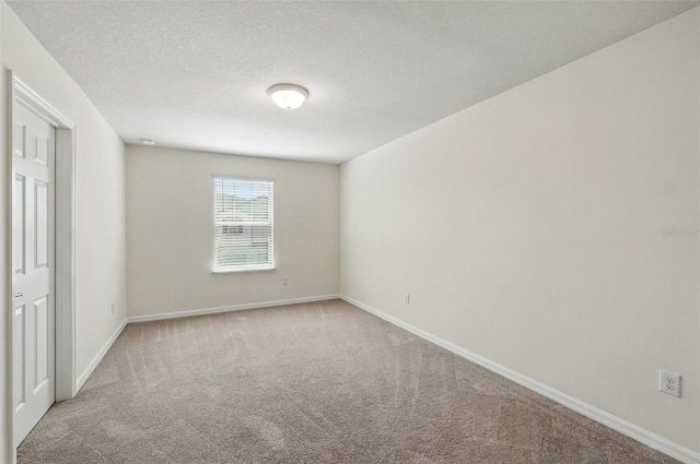 5024 Sylvester Loop, Tampa, FL 33610 - unfurnished bedroom featuring carpet flooring and baseboards