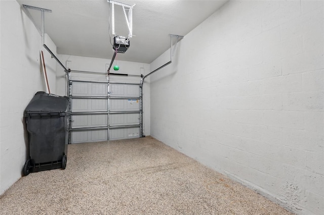 5024 Sylvester Loop, Tampa, FL 33610 - garage featuring a garage door opener