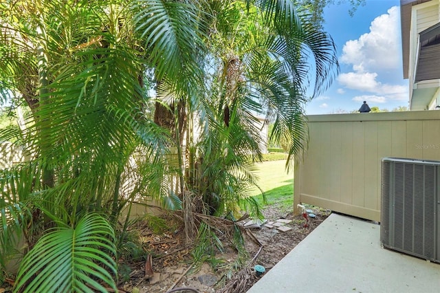 5024 Sylvester Loop, Tampa, FL 33610 - view of yard with cooling unit and a patio