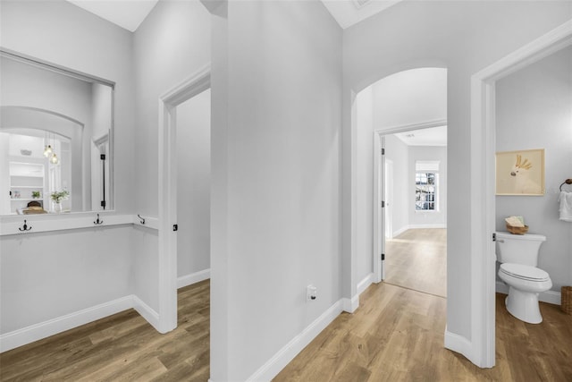 5225 Brighton Shore Dr, Apollo Beach, FL 33572 - bathroom featuring wood finished floors, toilet, and baseboards