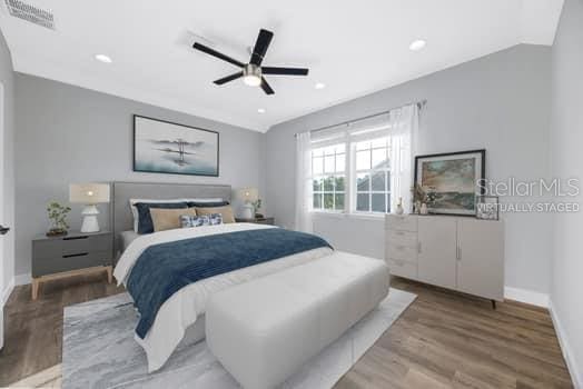 5225 Brighton Shore Dr, Apollo Beach, FL 33572 - bedroom featuring light wood-type flooring, baseboards, recessed lighting, and ceiling fan
