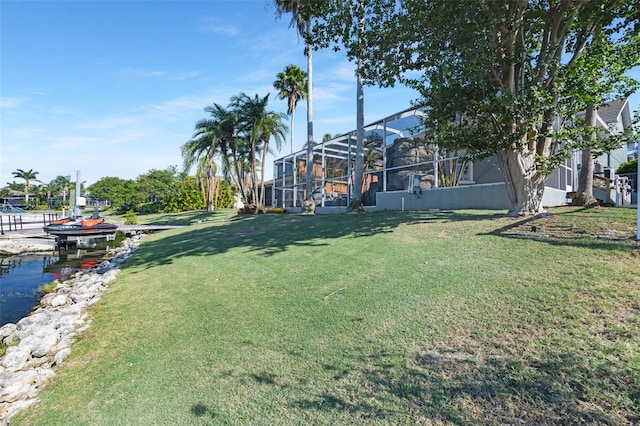 5225 Brighton Shore Dr, Apollo Beach, FL 33572 - view of grassy yard with glass enclosure