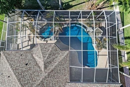5225 Brighton Shore Dr, Apollo Beach, FL 33572 - outdoor pool featuring a lanai