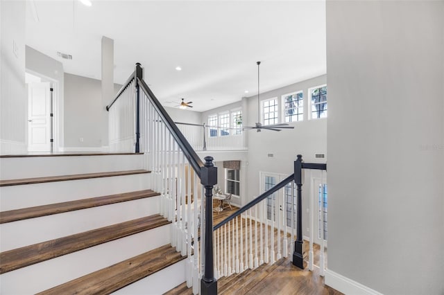 5225 Brighton Shore Dr, Apollo Beach, FL 33572 - staircase with a ceiling fan, wood finished floors, baseboards, and recessed lighting