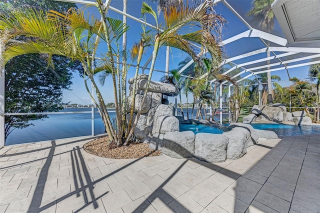 5225 Brighton Shore Dr, Apollo Beach, FL 33572 - swimming pool with glass enclosure, a water view, and a patio area