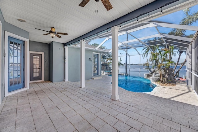 5225 Brighton Shore Dr, Apollo Beach, FL 33572 - outdoor pool featuring a ceiling fan, a patio, and a lanai