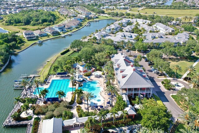 5225 Brighton Shore Dr, Apollo Beach, FL 33572 - aerial view of property and surrounding area with a nearby body of water and nearby suburban area