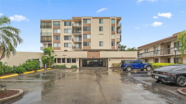6269 Palma Del Mar Blvd S Unit 306, Saint Petersburg, FL 33715 - view of apartment building / complex featuring uncovered parking