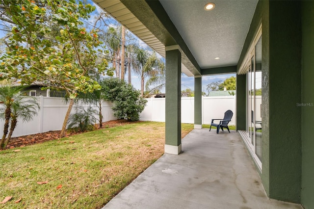 511 Roanoke St, Dunedin, FL 34698 - view of yard featuring a patio area